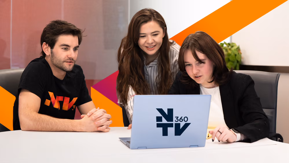 The NTV360 team collaborating in the office